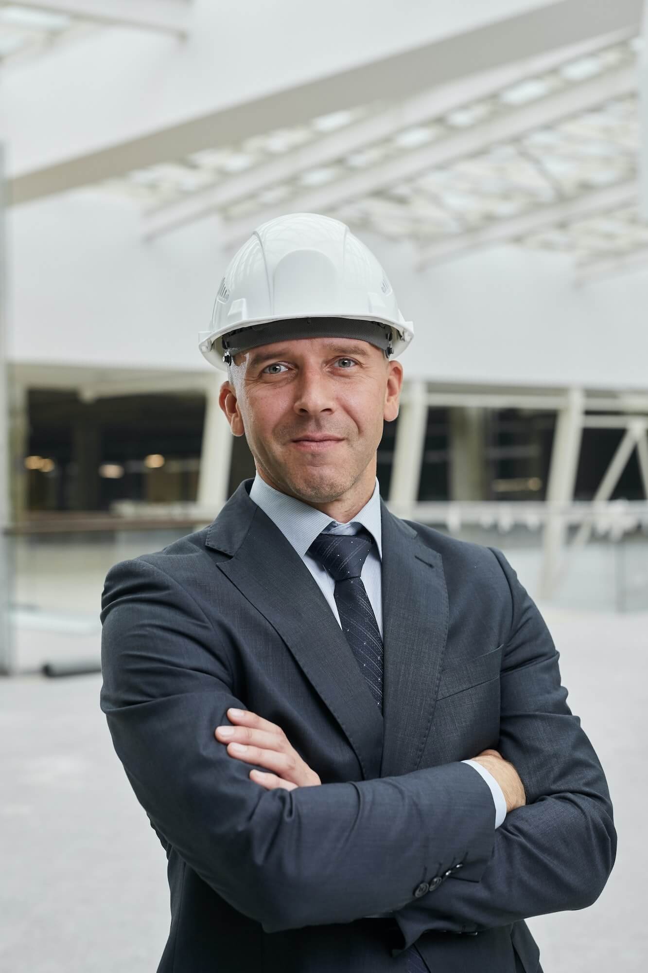 confident-businessman-at-construction-site-1-1.jpg